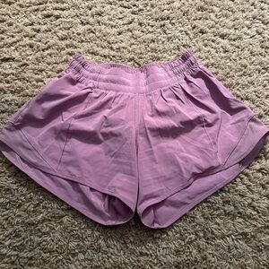Lululemon hotty hot shorts 4” size 4 in a blush pink/ purple color.